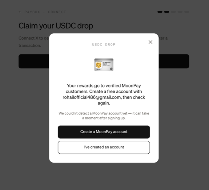 A USDC DROP popup from Paybox Connect stating rewards go to verified MoonPay customers, prompting users to create an account or confirm they've made one.
