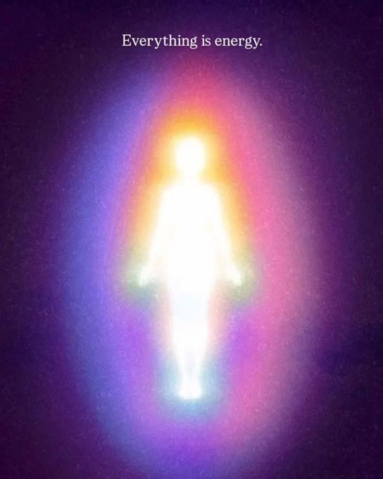 A glowing human silhouette radiates rainbow-colored auras against a dark purple background, with the text "Everything is energy." displayed at the top. The image ties into the post's theme of manifestation by visually representing the metaphysical concept that the human form emits energy, suggesting the poster's crypto token is built on ideas of energetic alignment and spiritual abundance.