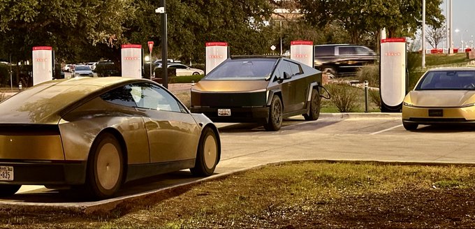Three Cybertrucks in gold and silver are parked at Tesla Supercharger stations, likely near a dealership.