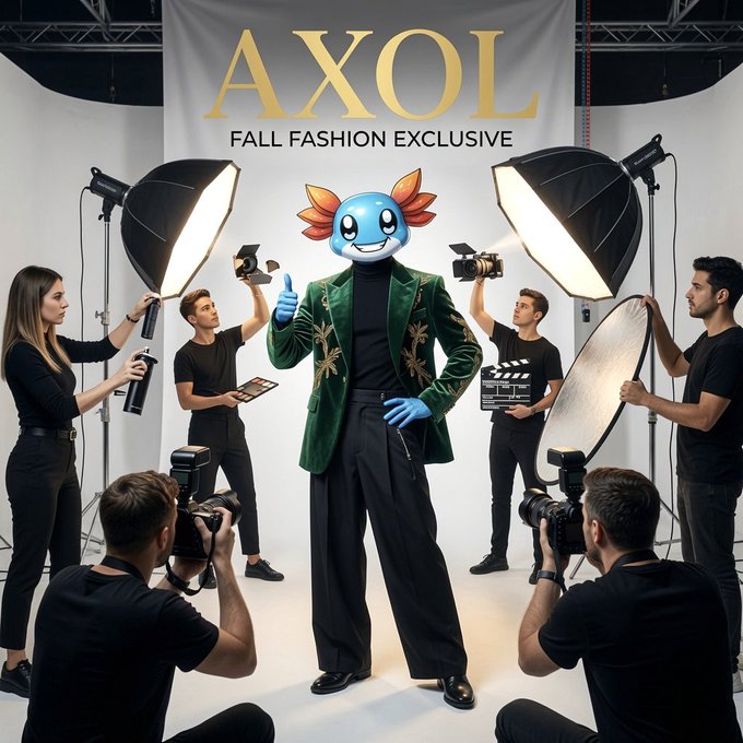 A photoshoot scene with the text 'AXOL FALL FASHION EXCLUSIVE' on a backdrop behind a blue axolotl character in a green velvet jacket, surrounded by photographers and crew with lighting equipment.