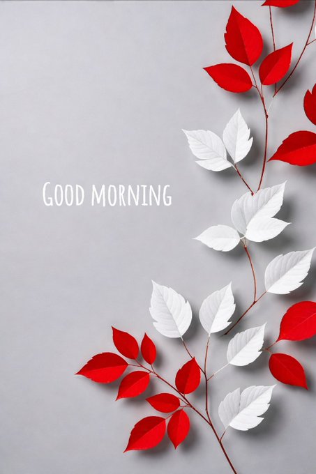 A minimalist 'Good Morning' greeting card with the text in white lettering on a gray background, decorated with red and white leaves on branches.