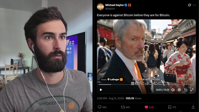 A split-screen showing a bearded man in a gray 'Smokey Days' shirt watching a Michael Saylor tweet on the right that reads 'Everyone is against Bitcoin before they are for Bitcoin' with a video of Saylor in Japan.