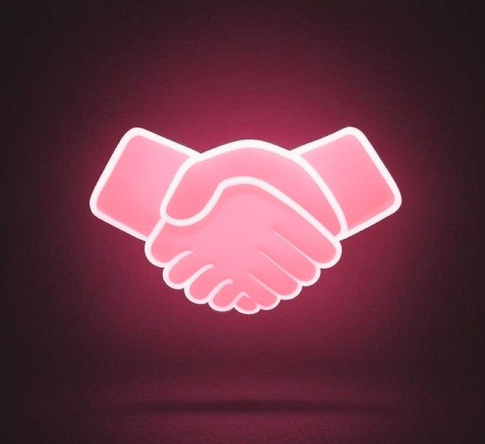 A neon-style pink handshake icon glows against a dark maroon background.