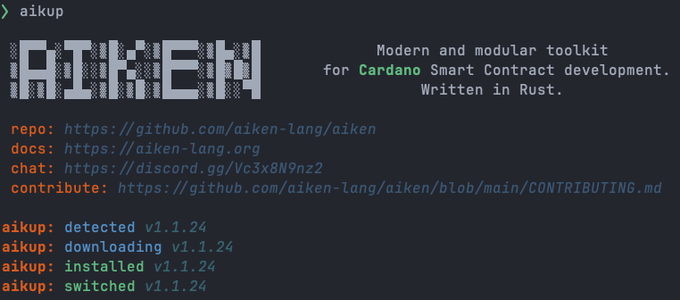 Terminal screenshot showing the 'aiken' logo for a modern and modular toolkit for Cardano Smart Contract development written in Rust, with links to repo, docs, chat, and contribute, and aikup installation logs for v1.1.24.