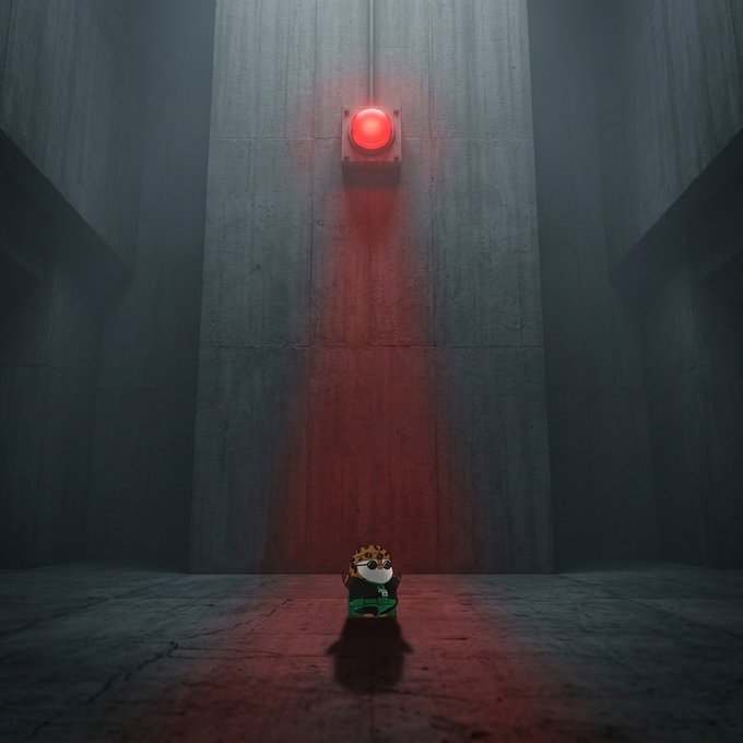 A small Garfield figurine wearing a green harness sits on a concrete floor beneath a towering concrete wall, illuminated from above by a glowing red emergency light that casts a dramatic crimson glow.