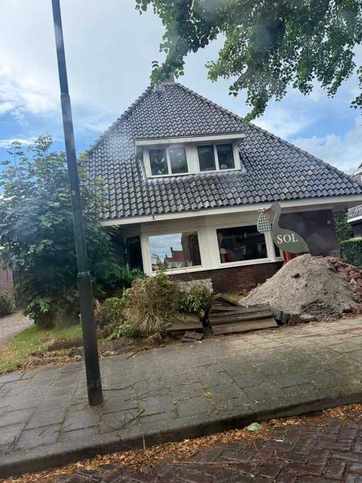 The image shows a house with a "For Sale" sign, indicating that someone has recently moved out or is selling the property. The house appears to be in a residential area, as there are trees visible nearby. A person's name is also mentioned in the image, which could potentially be related to the house being sold.

The post features an image of a baby with the caption "Which one of you crazy people just named their newborn 'SOL'?!". This humorous message adds a lighthearted touch to the otherwise serious topic of selling or moving out of a home.