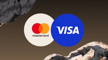 The image displays the Mastercard and Visa logos side by side, representing two of the major financial partners mentioned in the announcement about the launch of the new stablecoin $OUSD.
