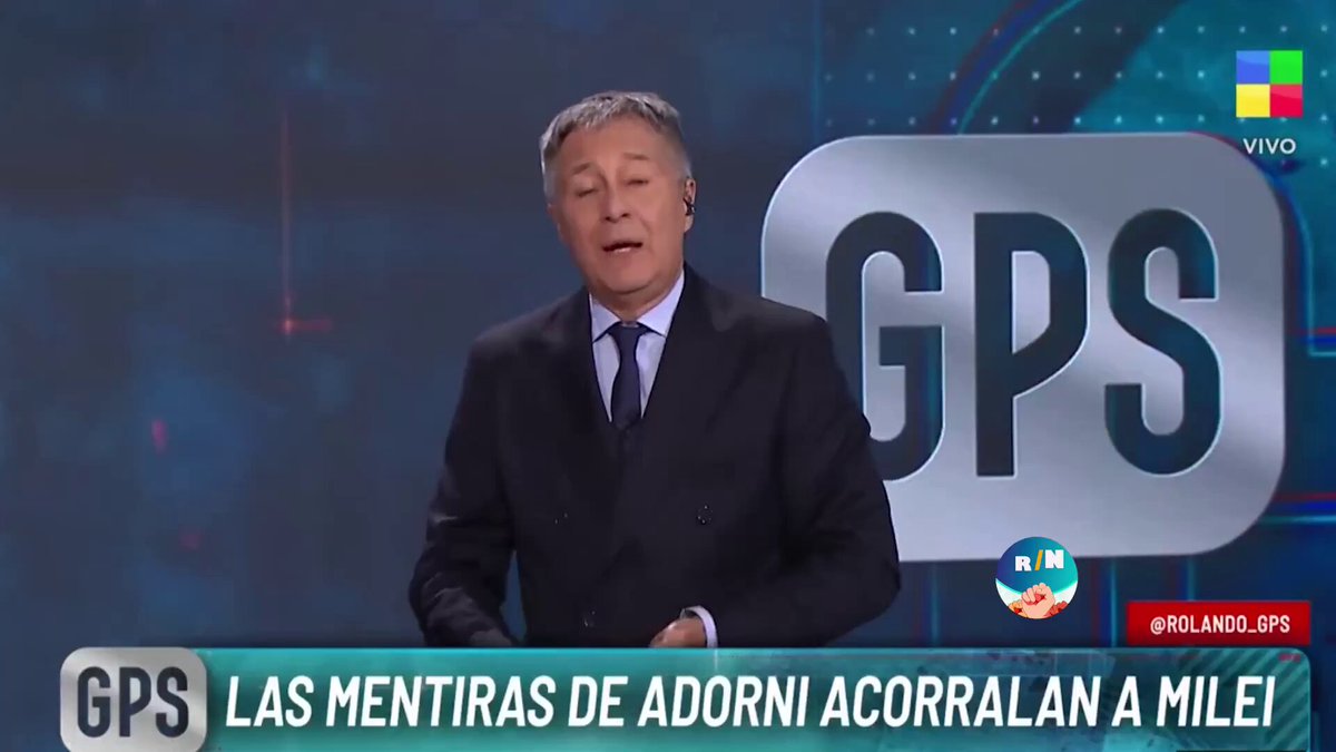 The image features a man dressed in a suit standing behind a podium with a microphone, giving him an authoritative presence as if he were delivering a speech or presentation. The text "GPS" can be seen in the background, indicating that this is likely related to a news story or event involving GPS technology. The image also contains some text about Milei Lied and his involvement in the LIBRA scheme, which suggests that there might have been an investigation into his activities.