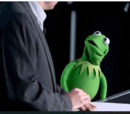 A scene shows Kermit the Frog standing next to a man in a dark suit at a podium, mimicking the man's posture as he appears to be speaking.