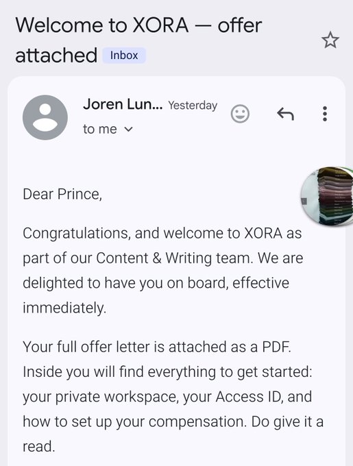 An email from Joren Lun titled 'Welcome to XORA – offer attached' congratulating 'Prince' on joining XORA's Content & Writing team, with the full offer letter attached as a PDF.