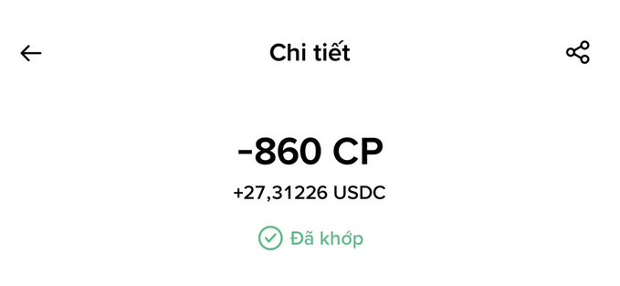 A Vietnamese app screen showing 'Chi tiết' (Details) with '-860 CP' and '+27,31226 USDC' indicating a successful match ('Đã khớp').