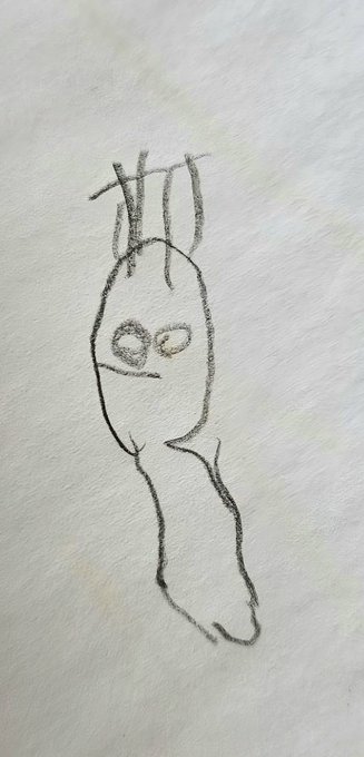 A simple pencil sketch on white paper depicting an abstract, elongated creature with two antennae-like protrusions and oval eyes.