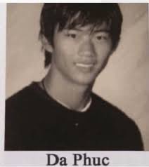 A black-and-white portrait photo of a young man with dark hair wearing a black shirt, with the caption "Da Phuc" beneath it. The post jokingly references the resemblance to "Da Phuc," whose name became a viral meme, suggesting he be "onboarded" onto a Chinese blockchain.