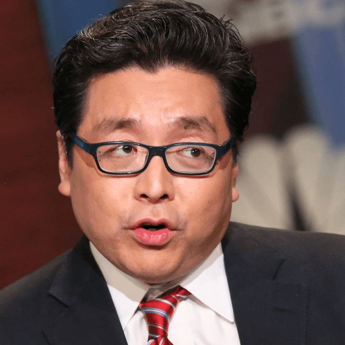 "A man wearing glasses, a red tie, and a suit jacket with white collar stands next to a computer screen displaying information related to cryptocurrency regulation. The text in the image suggests that Bit Mine has accumulated 126,971 ETH, now controlling 4.59% of the entire Ethereum supply. Combined crypto and cash reserves stand at $9.6 billion."