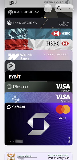 The image shows a phone screen displaying various credit card options from different banks such as Visa, Mastercard, and Bank of China. The cards are organized vertically with each bank's name displayed at the top. The text on the screen provides information about these credit cards, including their benefits like high cashback rates for certain terminals (WeChat, Alipay) and stable transactions. The image also includes a caption that reads "I'll first explain the reasons and advantages for choosing Etherfi: Stable, high cashback, and consumption terminals (We chat, Alipay)", which is likely an advertisement or promotional material for the credit card service.
