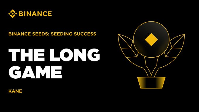 A black promotional graphic for Binance featuring 'BINANCE SEEDS: SEEDING SUCCESS' and 'THE LONG GAME' text alongside a gold plant illustration with a Bitcoin 'B' logo.