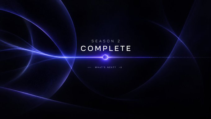 A dark, futuristic graphic with glowing blue light waves and text reading 'SEASON 2 COMPLETE' with a '← WHAT'S NEXT? →' link.
