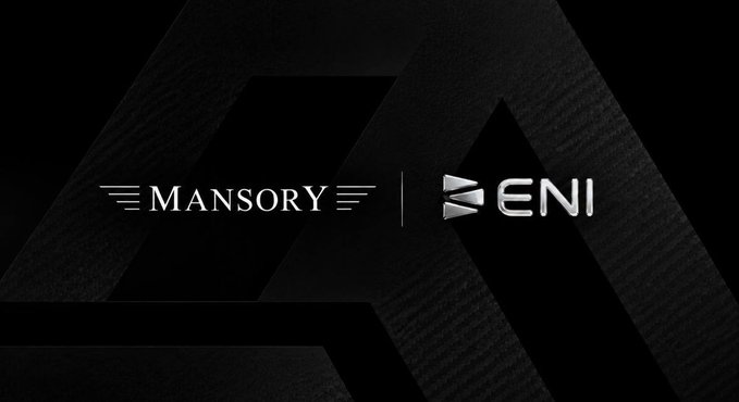 A black and silver logo image displaying the text 'MANSORY' alongside the 'ENI' branding, set against a textured dark background.