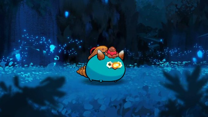 The image features a cartoon character, likely a bird or an animal, sitting in front of a forest with blue leaves. The character appears to be wearing a hat and has a backpack on its back. The background of the image is dark blue, which contrasts with the bright colors of the character's outfit and the surrounding environment. There are also some lights visible in the scene, possibly representing the glow from the forest or other sources of light. The post seems to be promoting an app called "axieinfinity.com/marketplace/ax".