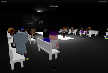 A screenshot of a virtual reality event showing blocky avatars seated at white tables in a dark conference hall, with text on screen including 'ATTICA'.