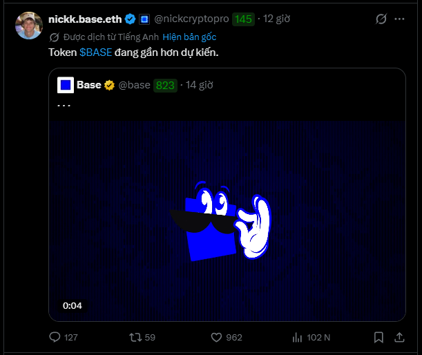 The image shows a social media post with a blue square graphic that has a hand holding up its middle finger, wearing sunglasses. The post also contains text in Vietnamese and English, which might be related to the content of the post or could be part of the caption. The post is tagged with the hashtag #base, indicating it's likely about a base-related topic.