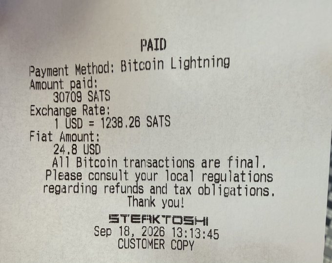 A printed receipt from Steak 'n Shake shows a Bitcoin Lightning payment of 30,709 SATS, equivalent to $24.80 USD at an exchange rate of 1 USD = 1238.26 SATS, dated September 18, 2026.