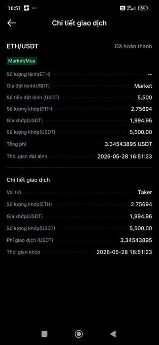 The image shows a cellphone screen displaying information about currency exchange, specifically concerning Bitcoin and ether (ETH). The text on the phone screen says "Thấy nhiều anh em mua mỗi ngày một eth sol btc". The user's location seems to be in Thailand.
