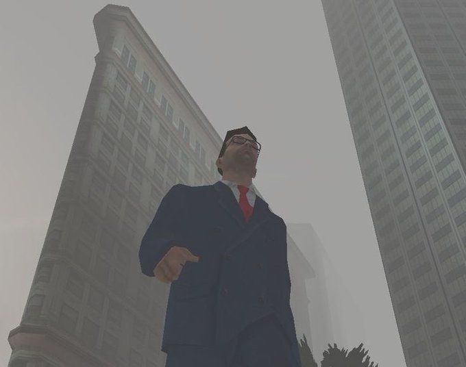 A low-angle shot of a 3D-rendered man in a dark suit and red tie, wearing glasses and standing between towering skyscrapers in a foggy city environment.