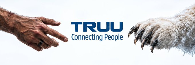 A graphic shows a human hand reaching toward a monstrous, furry creature's claw reaching from the opposite side, separated by the blue text 'TRUU Connecting People'.