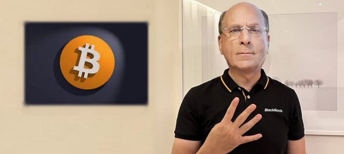 A man wearing a BlackRock polo shirt stands next to a Bitcoin logo mounted on a wall, holding up four fingers.