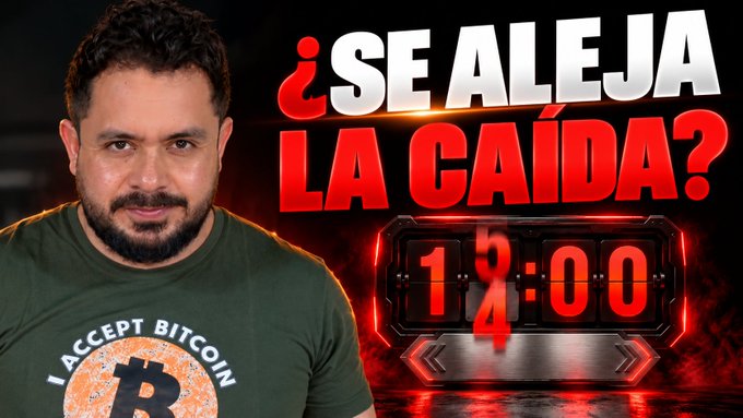 A man wearing an "I ACCEPT BITCOIN" t-shirt appears beside bold red text reading "¿SE ALEJA LA CAÍDA?" alongside a digital countdown showing "13:00," visually introducing a video about Bitcoin's price resilience following a strong Q3 and the statistical advantage October historically holds for $BTC.