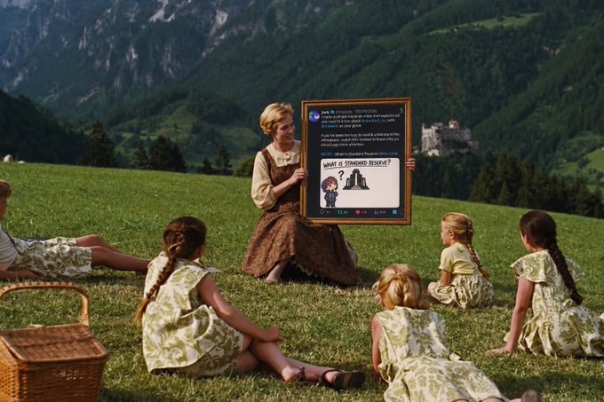 Surreal composite image showing a woman in traditional Bavarian dress sitting in a green mountain meadow holding up a Twitter post, surrounded by several girls in matching dresses sitting in the grass, with a castle visible on a distant mountainside.