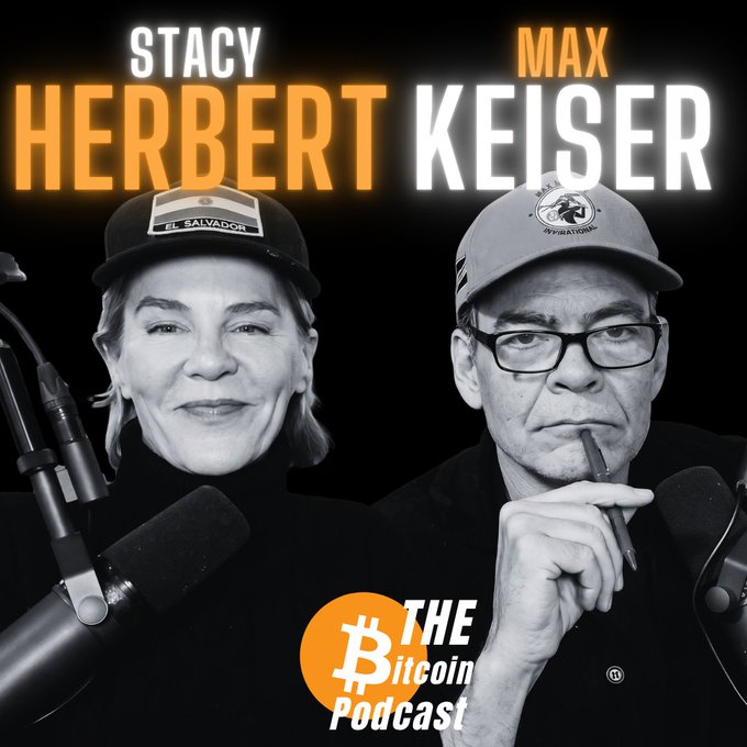 Promotional graphic for "The Bitcoin Podcast" episode featuring Stacy Herbert and Max Keiser, whose names appear in large white and orange text above their black-and-white portraits. Both hosts are shown wearing caps (Stacy's reads "EL SALVADOR" while Max's displays "MAX KEISER"), positioned in front of microphones with the orange Bitcoin logo and "The Bitcoin Podcast" branding at the bottom, promoting an episode titled "Bukele, Bitcoin & Wall Street: The Fight for the Future of Civilization."