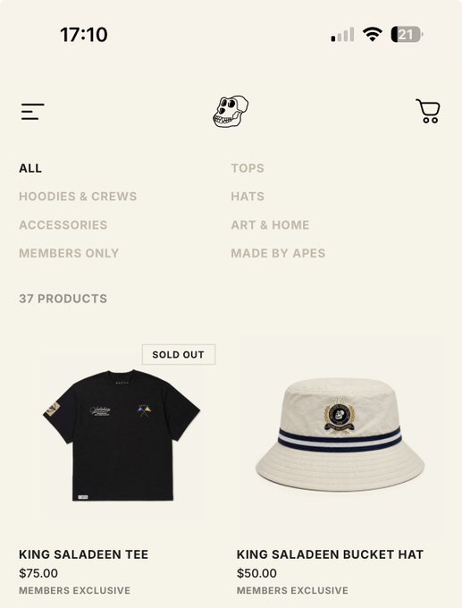 A mobile shopping app screenshot showing a store menu with categories like Hoodies & Crews and Hats, displaying a 'King Saladeen Tee' ($75.00) marked Sold Out and a 'King Saladeen Bucket Hat' ($50.00), both Members Exclusive.
