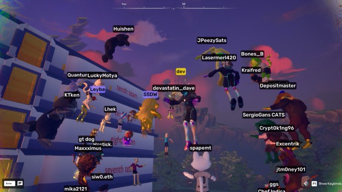 A screenshot from a video game showing numerous player avatars with usernames like Huisen, 3PeezySats, dev, devastatin_dave, and many others grouped together in a colorful landscape.