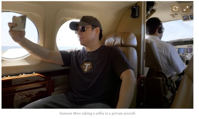 Samson Mow taking a selfie inside a private aircraft, wearing sunglasses and a cap, with a pilot visible in the cockpit.