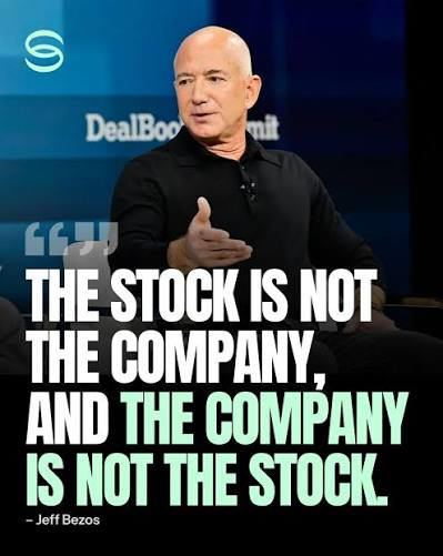 An image of Jeff Bezos speaking at the DealBook Summit with a quote overlay: 'THE STOCK IS NOT THE COMPANY, AND THE COMPANY IS NOT THE STOCK. - Jeff Bezos'