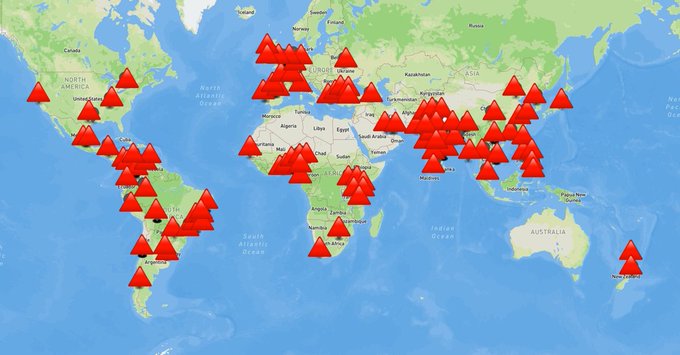 A world map showing numerous red tree icons clustered across multiple continents, including North America, South America, Europe, Africa, and Asia, indicating widespread geographic distribution.