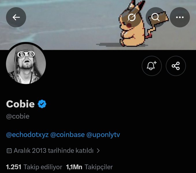 A Twitter/X profile page for "Cobie" (@cobie) featuring a Pikachu header image, with the account verified and tagged with @echodotxyz @coinbase @uponlytv, showing 1.1M followers. The image ties to the caption as it visually pairs the verified Cobie account with the iconic Pokémon character Pikachu.