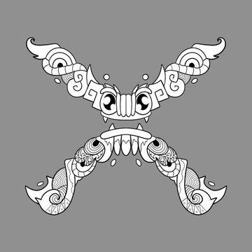 A black-and-white symmetrical ornamental design featuring mirrored eye motifs, tusks, and decorative swirl patterns on a gray background.