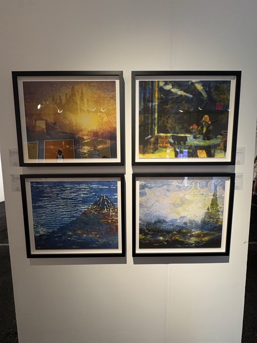 Four framed artworks are displayed on a white gallery wall in a 2x2 grid, including what appears to be reproductions of Hopper's 'Nighthawks' and Hokusai's 'The Great Wave off Kanagawa' alongside two other paintings.
