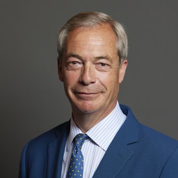The image shows a portrait of Nigel Farage, the leader of Reform UK, wearing a blue suit, striped shirt, and blue patterned tie against a gray background. This relates to the post about allegations that Farage failed to declare funding from convicted fraudster George Cottrell, linked to the crypto bookmaker Tether.bet.