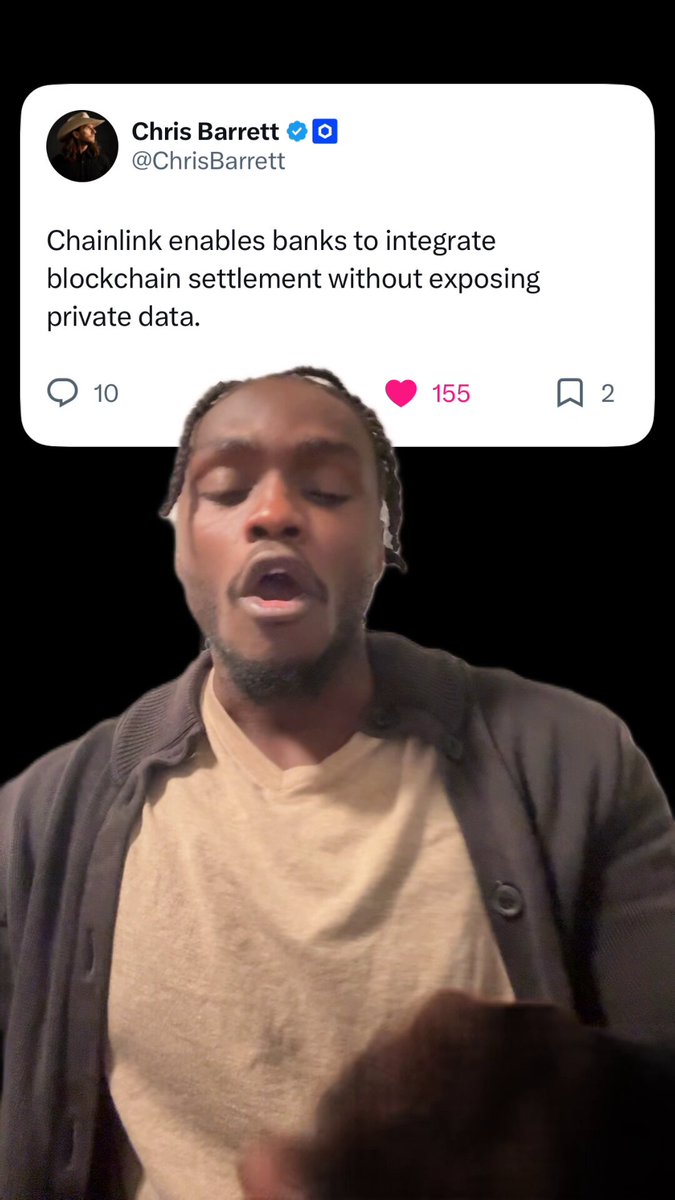 The image features a man with dreadlocks wearing a gray jacket, who appears to be making a funny face or showing off his teeth while looking at the camera. The caption of the image includes some text that reads "All of the world's money is moving on chain but no one in crypto is talking about how it's all going to work w/ @Memesandmkts @ ChrisBarrett @chainlink". This suggests that the man might be making a joke or expressing his thoughts about the current state of cryptocurrency and blockchain technology.