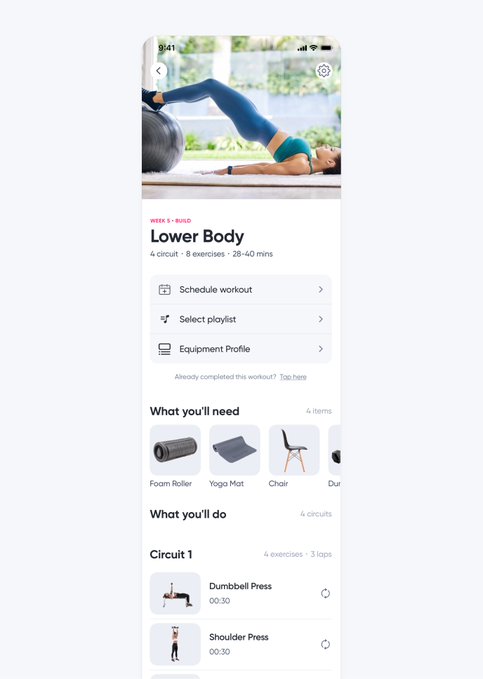 A mobile app screen displays a 'Lower Body' workout plan with details: '4 circuit, 8 exercises, 28-40 mins', featuring options to schedule, select a playlist, and view equipment profile (Foam Roller, Yoga Mat, Chair). The page lists circuit exercises including Dumbbell Press and Shoulder Press.