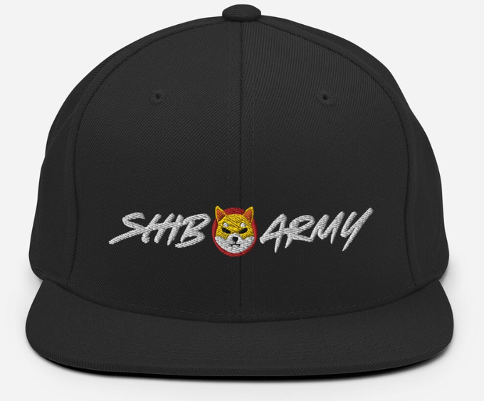 A black snapback hat featuring embroidered text that reads 'SHIB ARMY' with a Shiba Inu dog logo between the words.