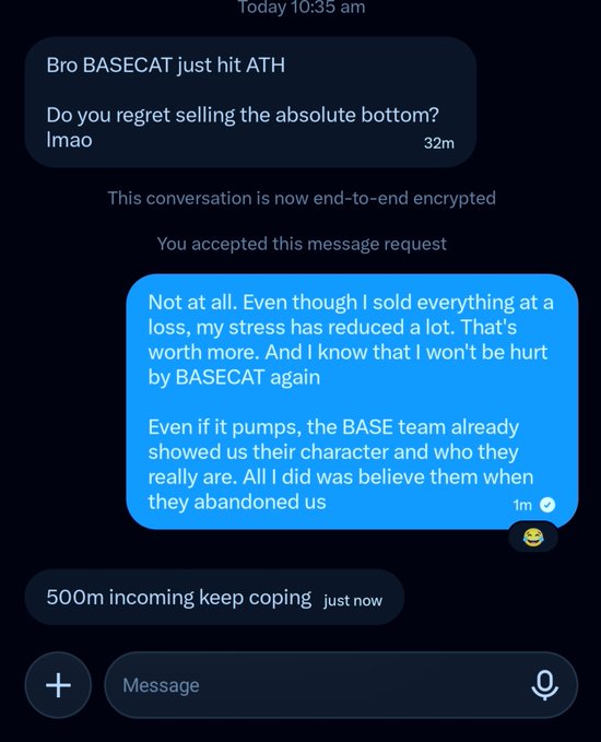 Text conversation screenshot about BASECAT token hitting all-time high, where one person explains they sold at a loss but has no stress, while the other responds "500m incoming keep coping".