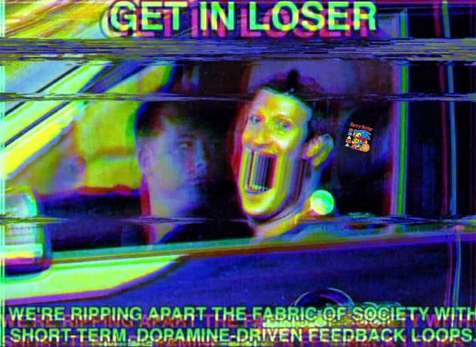 A heavily glitched, distorted image with neon colors featuring text that reads 'GET IN LOSER' at the top and 'WE'RE RIPPING APART THE FABRIC OF SOCIETY WITH SHORT-TERM DOPAMINE-DRIVEN FEEDBACK LOOPS' at the bottom.