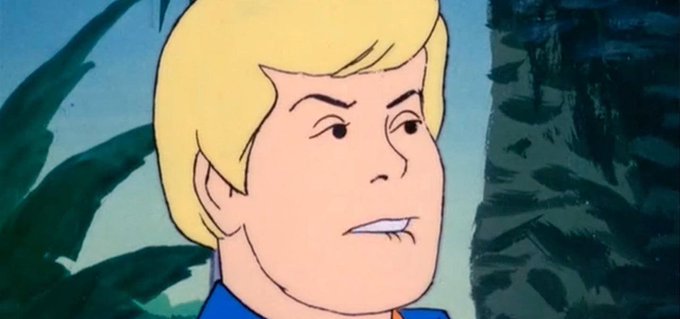 The image shows a close-up of Fred Jones from Scooby-Doo with a skeptical, suspicious expression and furrowed brow. The caption relates to the meme by using Fred's classic "something's not right here" look to humorously capture the doubtful feeling of holding a Litecoin short position during a rally.
