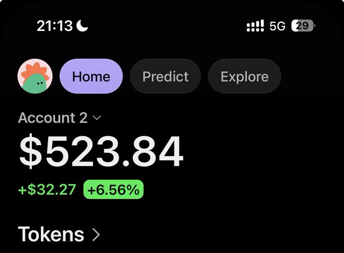 The image shows a mobile wallet app displaying an account balance of $523.84, with a daily gain of +$32.27 (+6.56%) on Account 2, suggesting someone showcasing their crypto profits. This ties to the post's $100 giveaway promotion, likely aimed at leveraging visible earnings to attract engagement and entries.