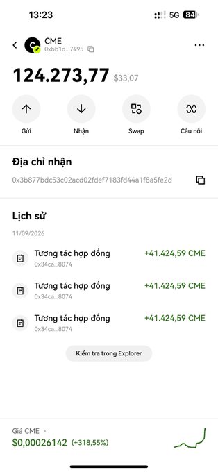 A screenshot of a crypto wallet showing CME token holdings of 124,273.77 (worth $33.07) with three "Contract Interaction" history entries of +41,424.59 CME each, dated 11/09/2026. This illustrates the surprise airdrop the user mentions, displaying the unexpected CME coin deposits that appeared in their wallet.